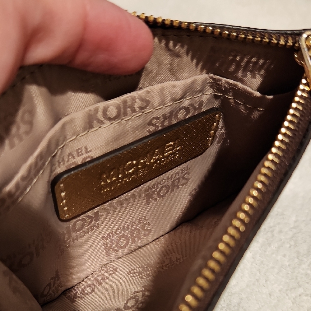 Michael Kors Black Wristlet with Rocket and Star Design - Picture 6 of 7